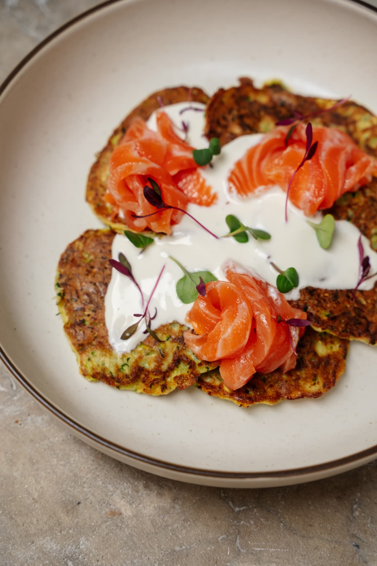 Zucchini pancakes with salmon